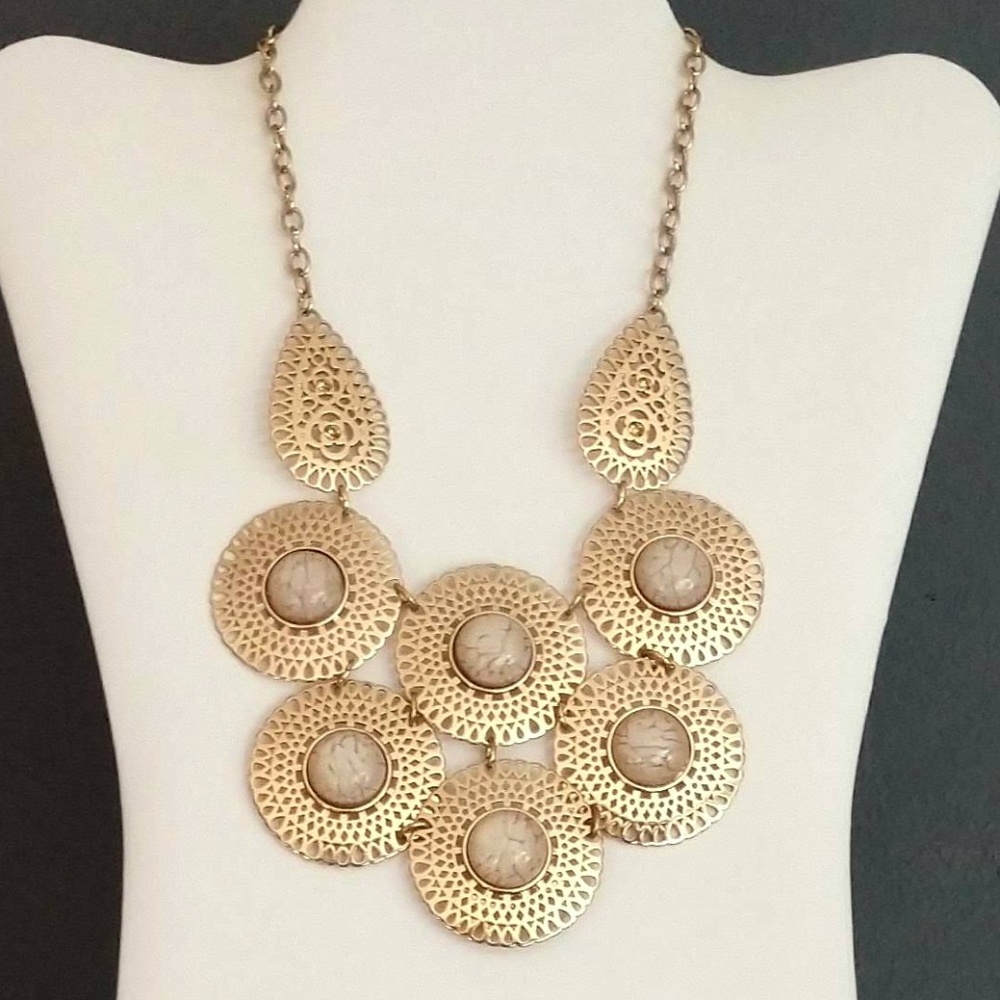 Gold tone filigree necklace w/cream glass centers